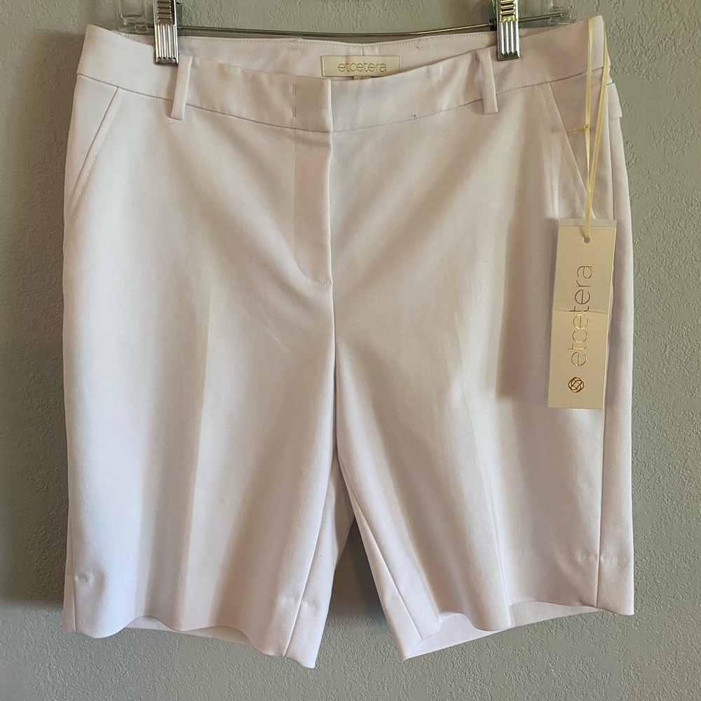 Etcetera woman’s white shorts.